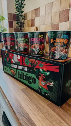 Four flavors of bibigo Ramyun noodles: Korean BBQ, Chicken, Kimchi, and Spicy Kimchi, showcased for a delicious taste test.