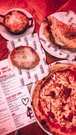 Delicious meal at Pizza Punks in Newcastle featuring unique pizzas and garlic bombs, perfect for lunch!