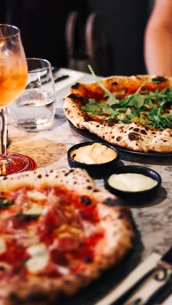 Sharing plates and Neapolitan pizza at Social by Matto in Edinburgh, perfect for a girls' night out.