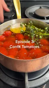 Delicious confit tomatoes with garlic and cheese, perfect for salads, pasta, toast, or straight from the jar.