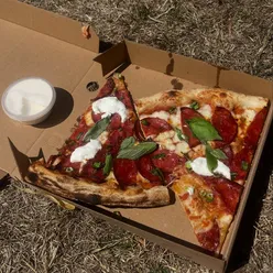 Delicious food crawl in London featuring pizza, cookies, mangonada, and birthday celebrations with friends.