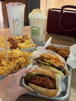 Fiery chicken burger with cherry pepper slaw and hot cheese fries, plus carrot cake milkshake at Shake Shack Cardiff.