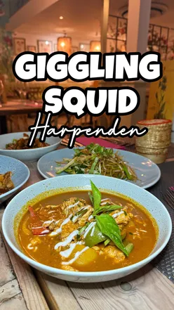 Patrons enjoying generous Bangkok Bites starter and Chicken Panang at Giggling Squid restaurant in Harpenden.