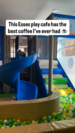 Parents enjoying coffee and cake while kids play at Rae’s Island, a delightful play café in Braintree.