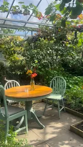 Stunning seasonal plates and gifts at The Secret Herb Garden, showcasing handcrafted gins and beautiful surroundings.