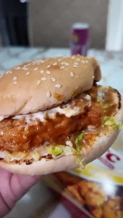 'Food tour in Moss Side featuring Crownchy Fried Chicken and vibrant local dining experiences.'