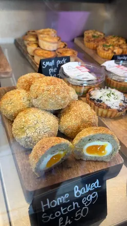 Visitors enjoying gourmet treats at Dunston Hall Garden Centre's Food Hall and Deli in Chesterfield, Derbyshire.