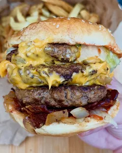 Five Guys takeaway featuring a triple burger and delicious fries, showcasing burger love. ❤️🍔 #FiveGuys #BurgerFan