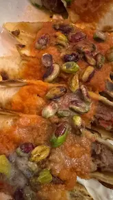 Dining at Ada Meyhane in Pangbourne, enjoying vibrant Turkish cuisine and live music with generous portions.