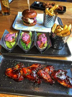 Delicious lunch at Canary Bar, Leeds Dock, featuring tacos, burgers, cocktails, and stunning waterfront views.