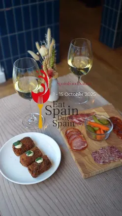 Guests enjoying a Spanish charcuterie plate and wine at @margadh_rha during the Eat Spain Drink Spain event in Ireland.