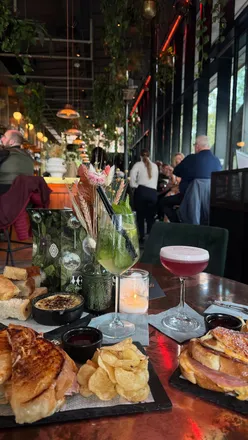 Delicious toasties, cocktails, and a stunning hot chocolate at Loretta's Tavern, a cozy date night spot in the city.