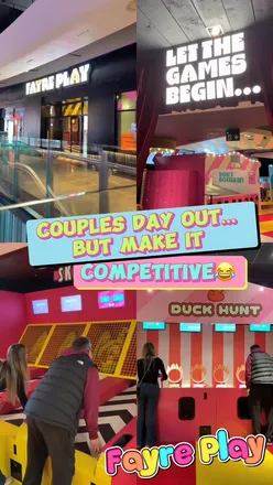 Couple enjoying burgers and cocktails at Fayre Play Newcastle, celebrating a fun day date filled with games.