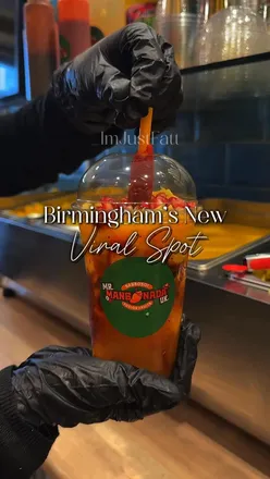 People enjoying vibrant dishes at a popular new eatery on Lady Pool Road in Birmingham.