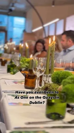 Guests enjoying a communal dining experience at As One, celebrating Irish produce and local vendors in Dublin.