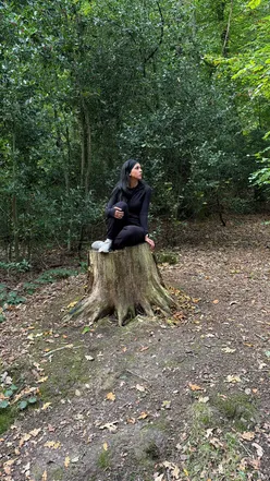 Hiker enjoying the Bluebells Trail at Lickey Hills, embracing nature and fresh air on a bucket list adventure.