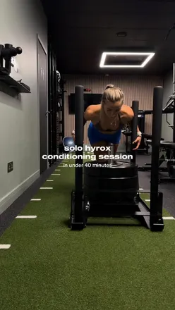 Person performing intense workout at Solo Sixty gym, promoting effective Hyrox conditioning exercises.