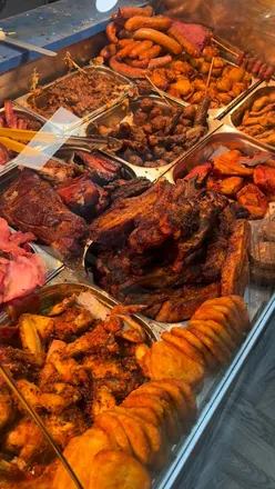 City workers enjoying affordable burgers and salt beef baguettes from Porterford Butchers in Fleet Street, London.