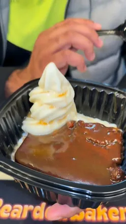 Indulging in hot Sticky Toffee Pudding with ice cream at Bearded Bakers in BD3 9RY this winter.