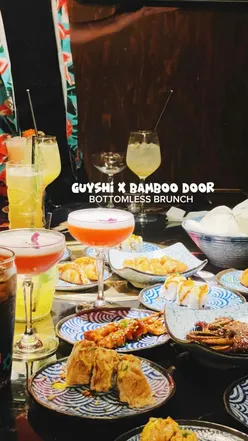 Friends enjoying bottomless brunch at Guyshi in Sheffield City Centre, celebrating with drinks and laughter.