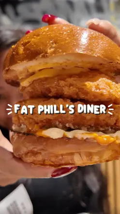 Food pun celebration at Fat Phil's Diner, Wood Green opening with 50% off menu items today!