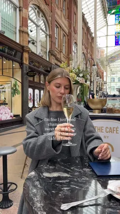 Friends enjoying champagne at The Cut and Craft in Leeds, celebrating a fun gathering with laughter and joy.