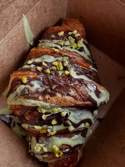 Veggie victory panini, chocolate & pistachio croissant, and cinnamon cookie from Palooza Italian Deli in London.