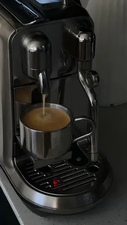 Person enjoying a vibrant day with gym, chores, pets, haircut, and dining at a new restaurant in London.