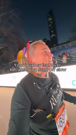 Runner reflecting on a year of progress and joy in training for marathons, embracing the journey over speed.