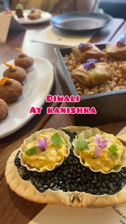 Diwali celebration meal at Kanishka Mayfair, featuring crab canapés, paneer tikka, and festive desserts.