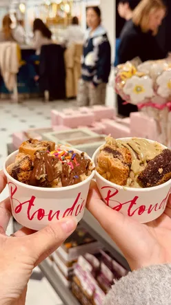 Delicious cookie dough delights and freshly baked cookies at Blondie's Kitchen in Selfridges, a sweet treat paradise.