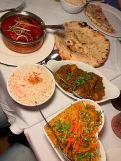 Enjoying delicious Indian curries and starters at Jashaan restaurant on Crwys Road during a special Thursday offer.