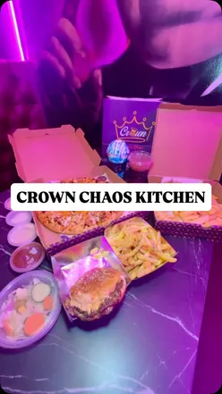 Delicious food at Crown Chaos Kitchen in Bradford: pizza, burgers, mocktails, and homemade sauces in a vibrant setting.