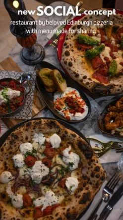 Interior of SOCIAL by Matto in Edinburgh, showcasing vibrant decor, Halloween theme, and inviting cicchetti at the window.