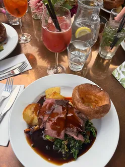 Enjoying a hearty roast beef Sunday lunch at The White Horse in Hertingfordbury, Hertfordshire, with cozy pub vibes.