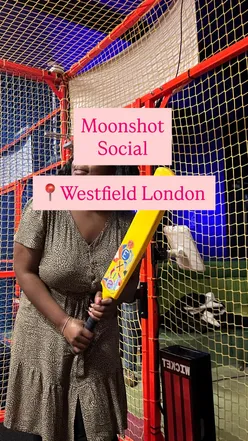 Playing cricket at Moonshot Social in Westfield Shepherds Bush, enjoying cocktails and a mixed dining experience.