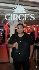 Guests enjoying immersive experiences and cocktails at Circe's Rooftop event, 'The Lost Hour' in London.