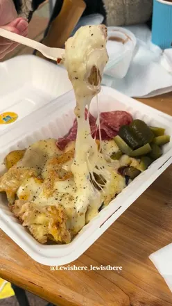 Cheesy raclette and delicious Basque cheesecake at Cheese Box in Glasgow, a must-try for cheese lovers! 🧀✨