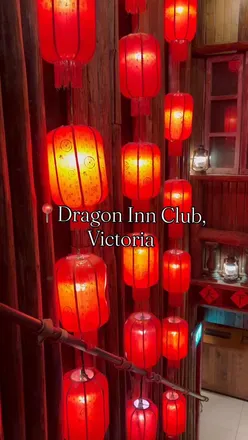 Delicious hotpot spread at Dragon Inn Club in Victoria, featuring Peking Duck, fried rice, and fresh seafood.