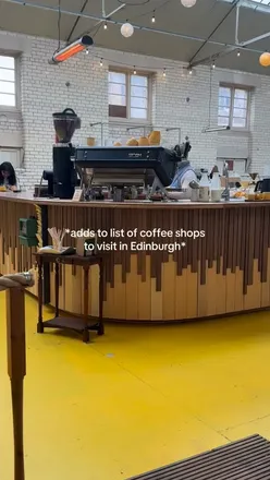 Cozy café scene at Santu Coffee in Edinburgh, showcasing delicious coffee and inviting ambiance.