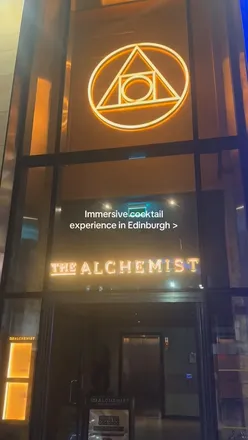 Drinks and cocktails at The Alchemist in Edinburgh, featuring a vibrant atmosphere and creative mixology.