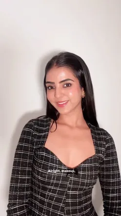 Skincare enthusiast showcasing night serum, day serum, and face mist from Simree Beauty for a glowing complexion.