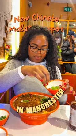 Delicious Malatang filled with meat and veggies at YGF Manchester, showcasing bold flavors and generous portions.