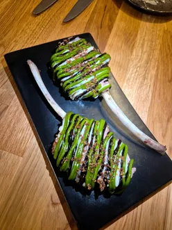 Delicious dishes at Album Southampton: dumplings, croquettes, lamb cutlets, and more in a vibrant dining atmosphere.