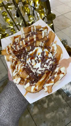 Delicious ice cream churro bites at Churros Locos in Milton Keynes, an unforgettable foodie experience!