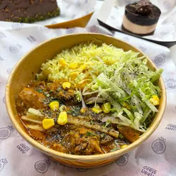 Delicious chicken jalfrezi rice bowl from Naan Stap Leicester, showcasing quality Indian cuisine for just £8.95.