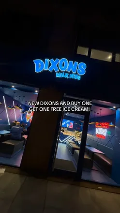 Exterior of Dixons Milk Ices' new shop on Leeds Road, Bradford, showcasing vibrant branding and inviting atmosphere.