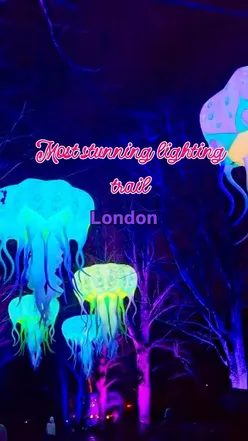 Families enjoying the magical Peter Pan-inspired light trail at Neverland in Kenwood, London, during half-term celebrations.