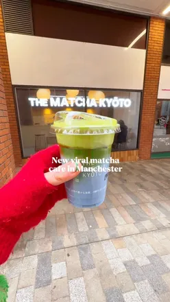 Celebrating the grand opening of a new shop at @thematchakyoto in Manchester with vibrant decor and joyful supporters.