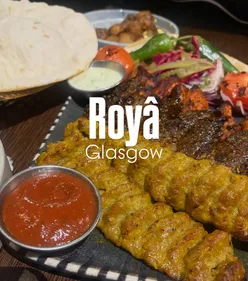 Middle Eastern, but make it iconic. 🔥 Royâ did not disappoint. 

@roya.gla 

The food, the vibes - everything was elite! The stand out dish has to be the Middle Eastern tatties - omg, UNREAL. How can potatoes taste that good? 😂 I would go back any day just to eat a plate of them. Obvi, hummus and bread is a must. I could legit live off that. Your gal even ate dates (can’t believe the Arab in me don’t eat dried fruits - but I did here). 

Small dishes vibes. Order a few dishes and share is my absolute fav thing to do. As usual, we over ordered. But no complaints from me. I’ve been to Saffron numerous time, but this was my first time finally visiting. Thank god I’ve finally made it. Will be back asap. Check out below everything we ordered 👇🏽

✨Turkish Cigars 7.95
Fried pastries with feta, spinach and Persian
dates served with a honey & thyme glaze. 
✨Middle Eastern Tatties 7.95
Double cooked baby potatoes seasoned with
coriander, garlic, chilli flakes and
saffron aioli.
✨Mini Kebab Platter 39.95
2 skewers of Koubideh kebab, Chicken
Tawook, Kebab Torsh, served with grilled
tomato, peppers, naan, rice and garlic
mayo, chilli sauce and house pickles.
✨Garlic Naan & hummus 

Comment your fav dish to order at @roya.gla 🫶🏽
